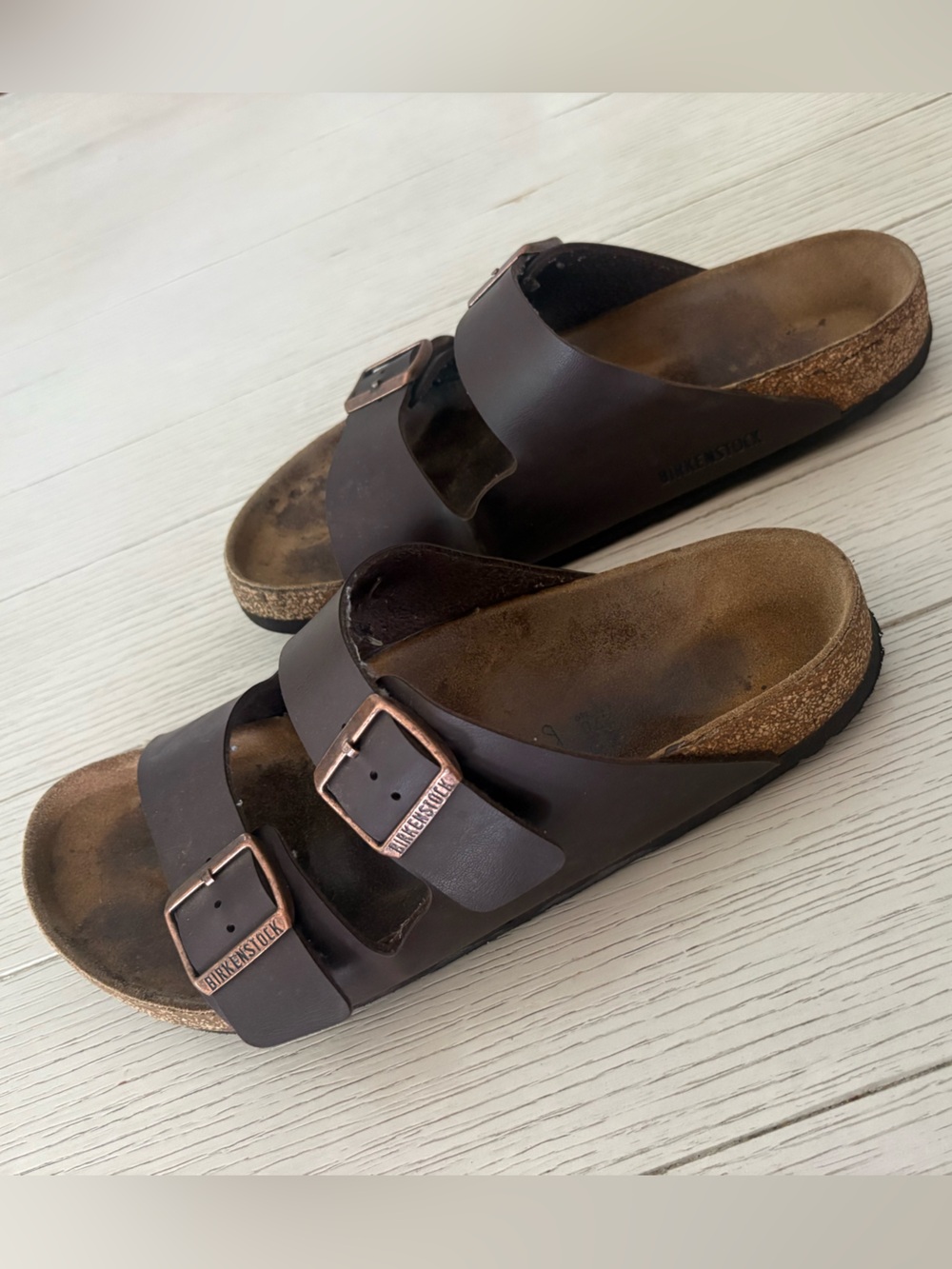 Birkenstock Two-Strap Sandals in Dark Brown with Copper Buckles
